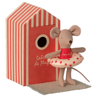 little sister beach mouse in cabin