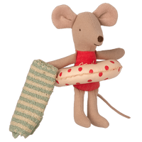 little sister beach mouse in cabin
