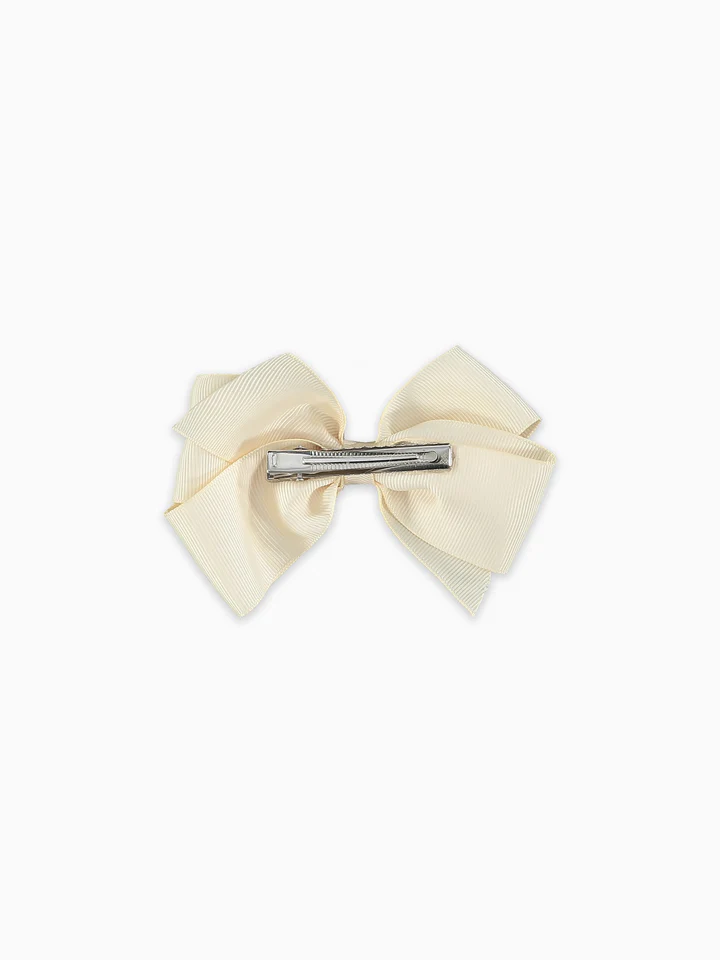 girls big bow clip off white
