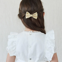 girls small bow clip gold