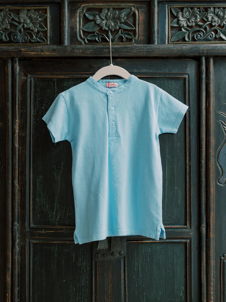 alcon polo shirt