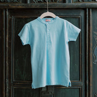 alcon polo shirt