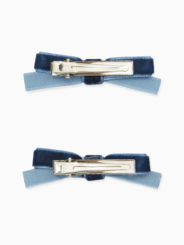 two small velvet bow clips navy