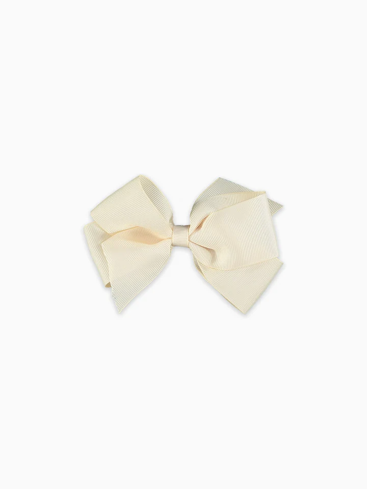 girls big bow clip off white