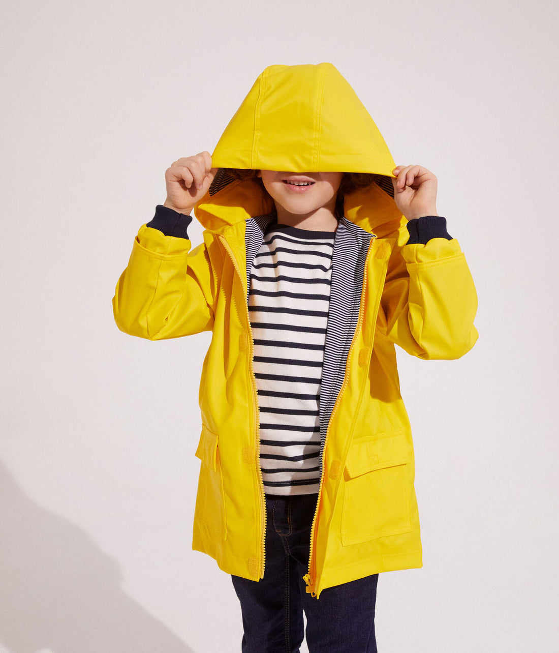 baby yellow hooded rain jacket