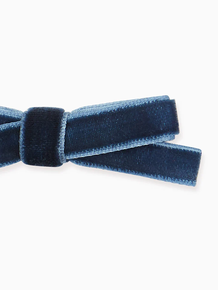 two small velvet bow clips navy